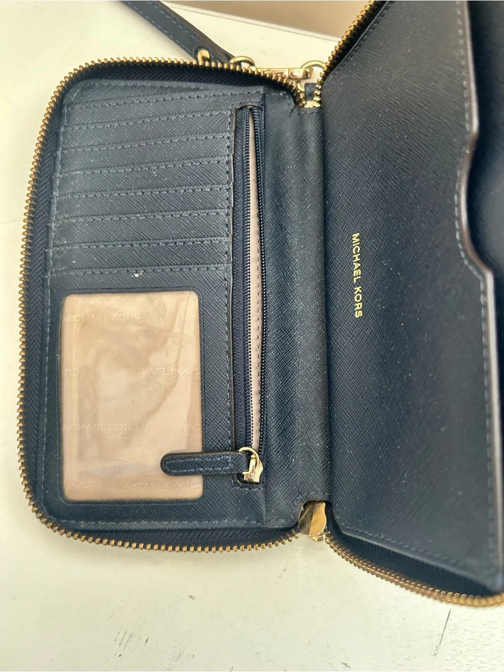 Michael Kors White & Navy Signature Logo Wristlet with Gold Plate